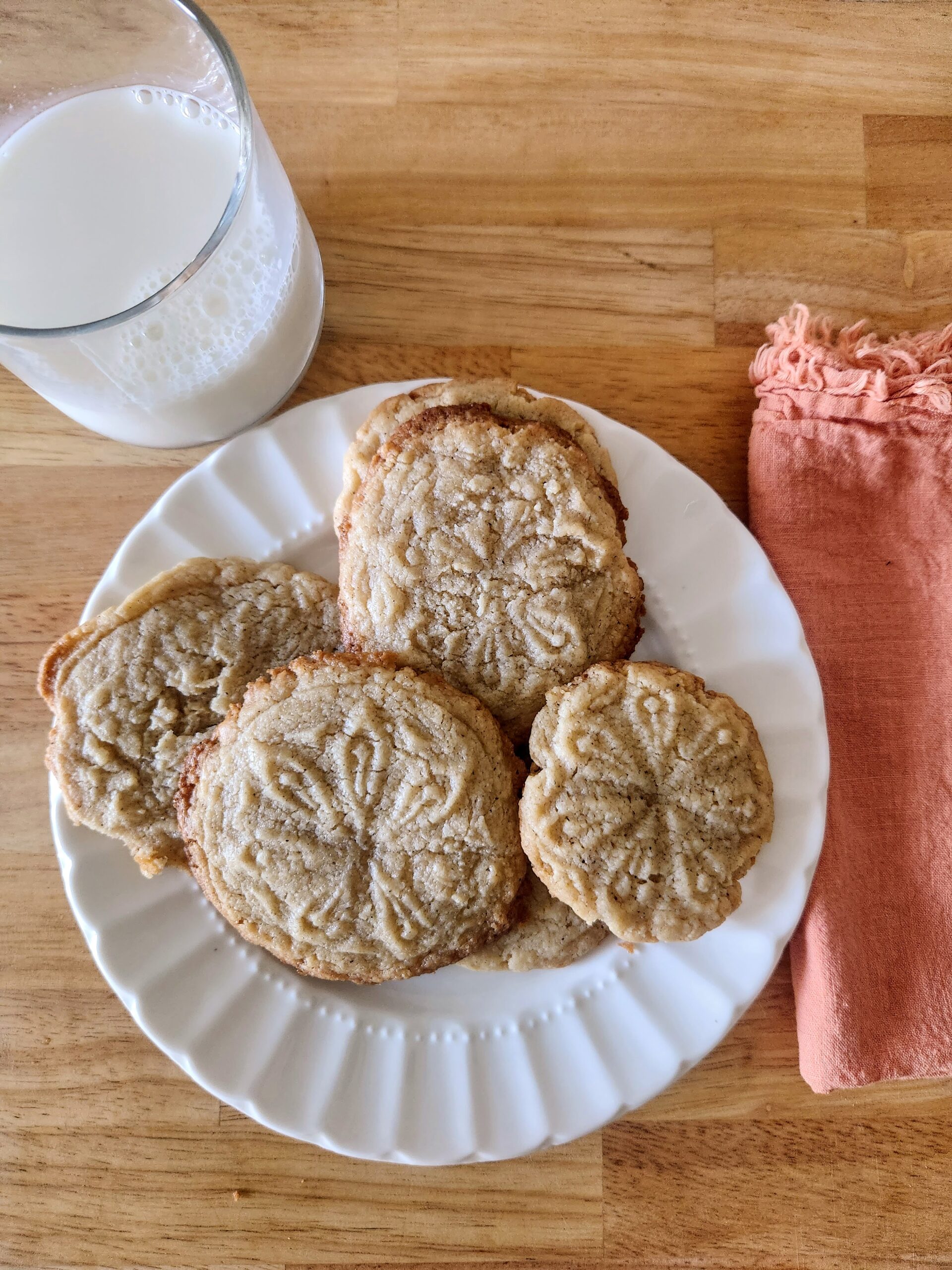 Plate of cookies with a glass of milk